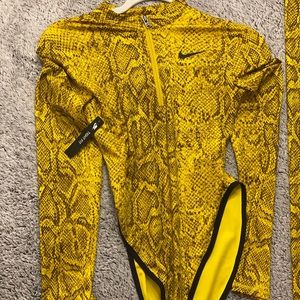 Matching Nike sports bodysuit and leggings set
